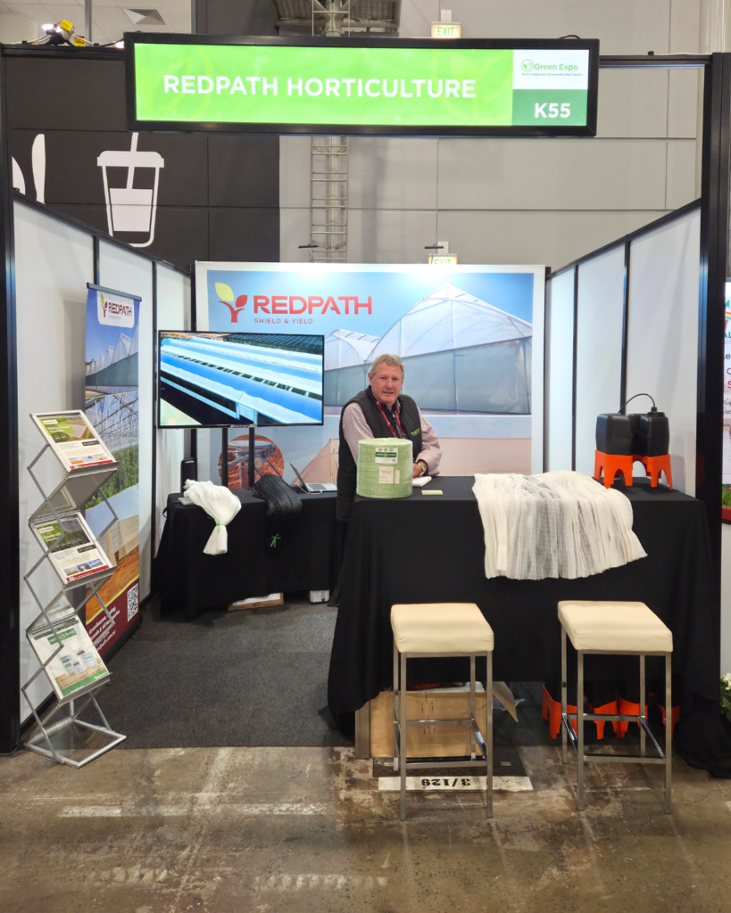 The Redpath Horticulture stand at Greenscapes + Green Expo 2026, showing Earthtwine twine, netting samples and a team member behind the display table.