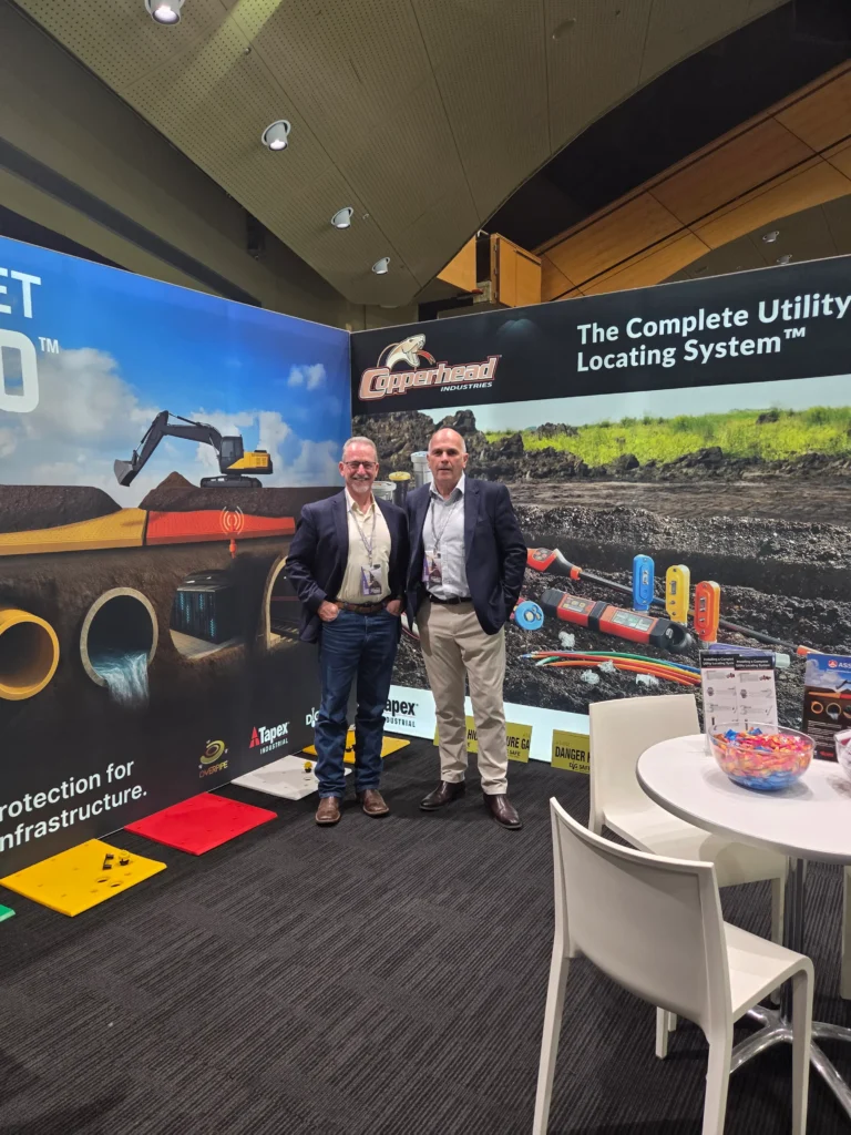 Mike and Paul at Tapex Industrial Stand APGA 2025