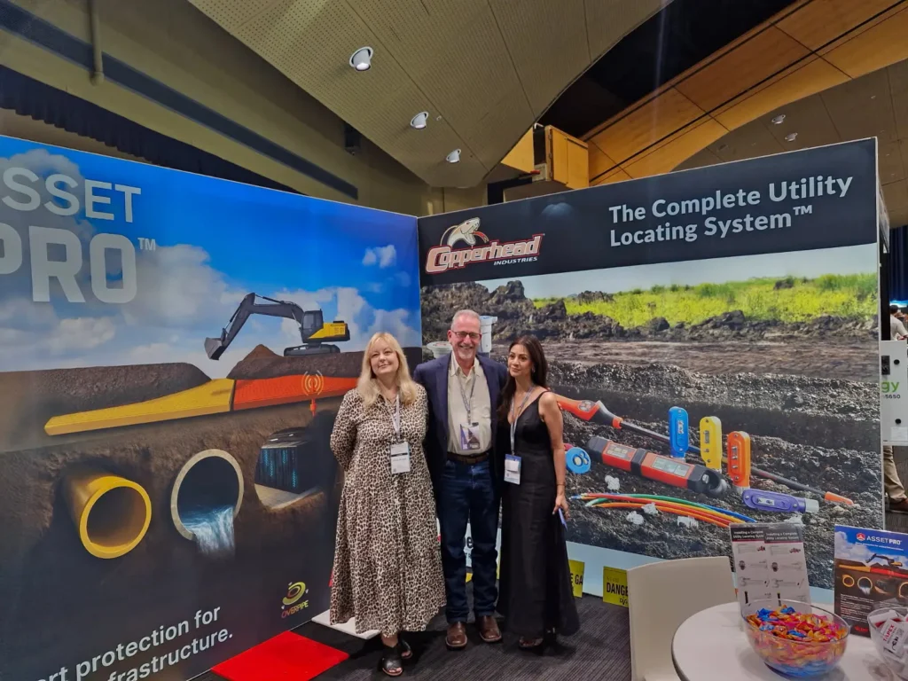 Empak and Copperhead representatives with Tapex Industrial stand at APGA 2025 exhibition